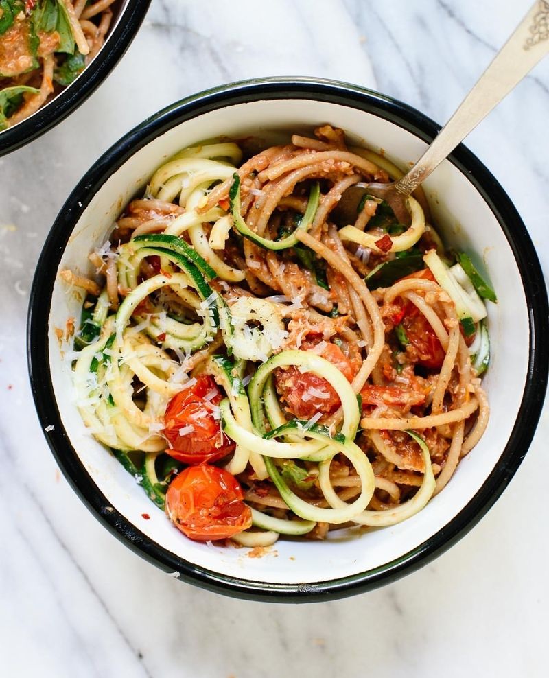 Zucchini Noodles With Pesto And Cherry Tomatoes